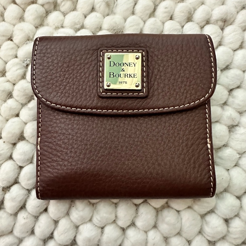 Dooney & Bourke brown pebbled leather bi-fold wallet